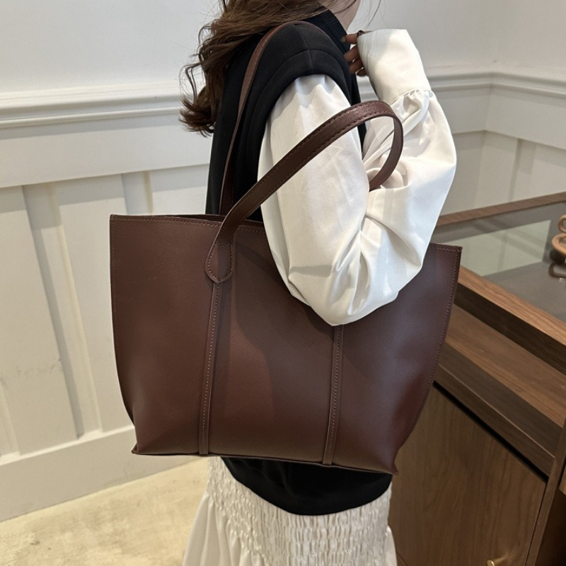 حقيبة كتف من الجلد الصناعي بتص - مراجعة Leather Work Laptop Bag وسعره
