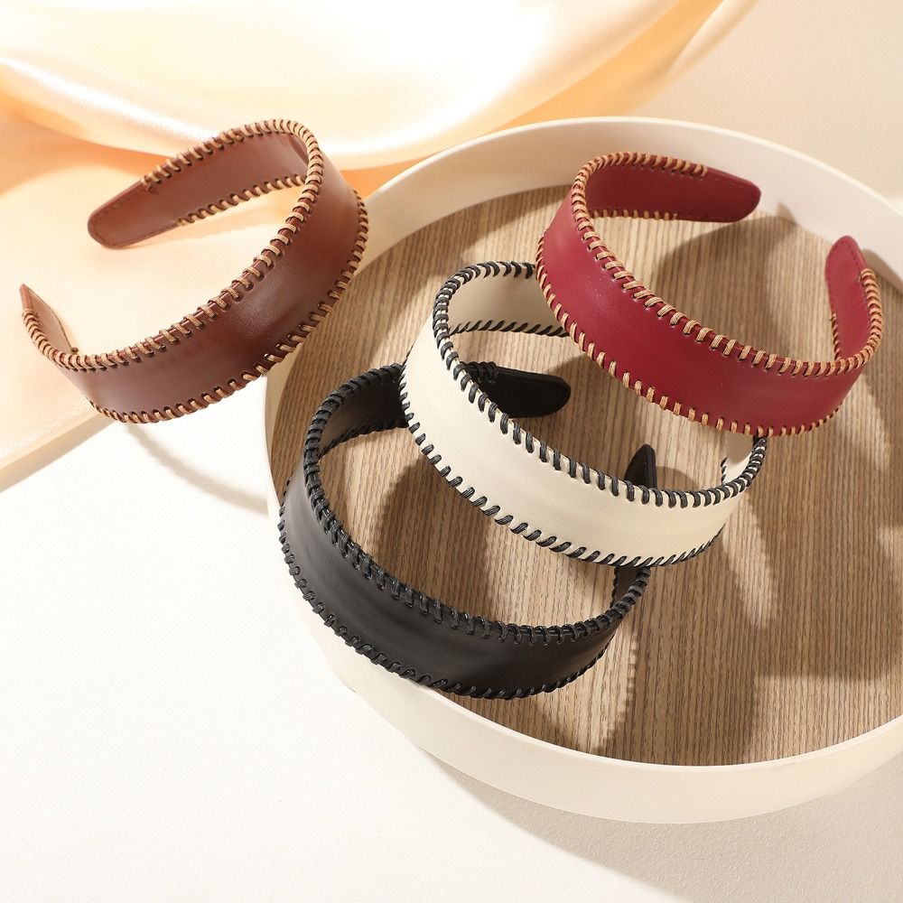 عصابة رأس جلدية بلون موحد على  - مراجعة Leatherwork Rings وسعره