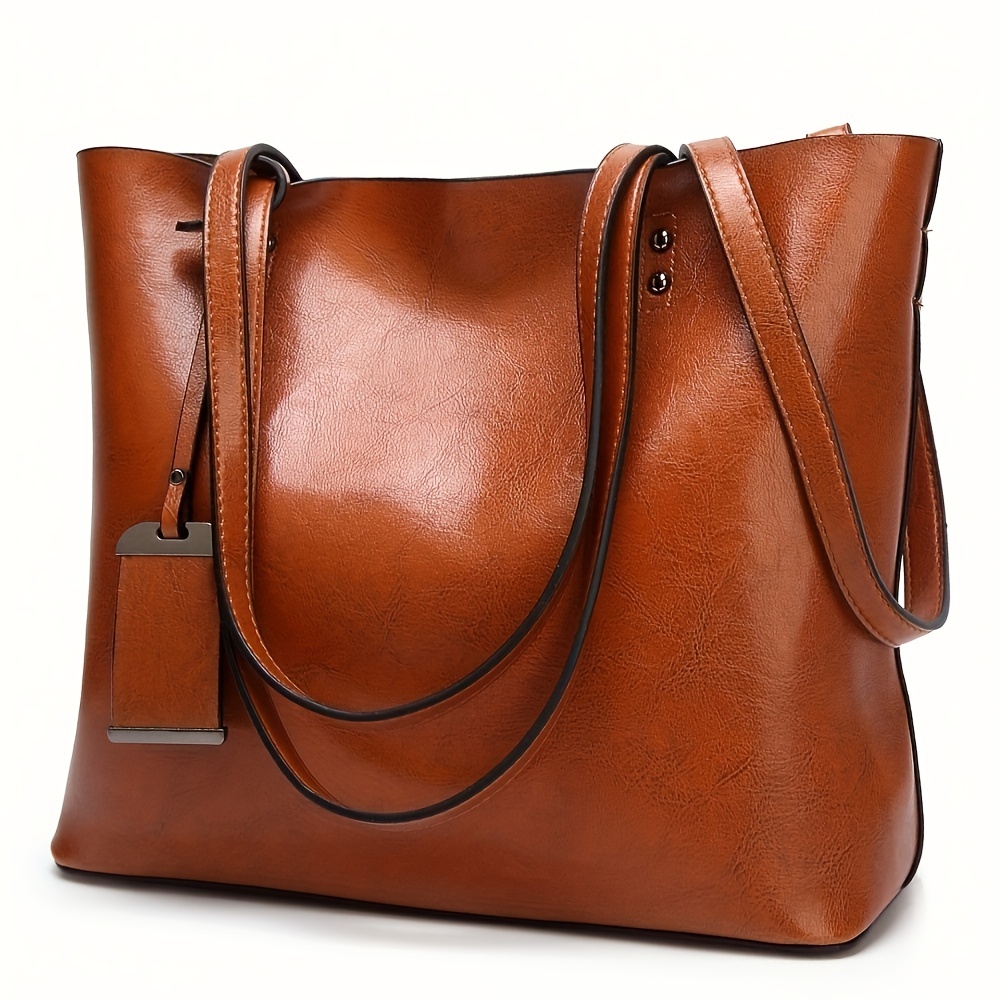 حقيبة يد جلدية كلاسيكية كلاسيك - مراجعة Leather Work Laptop Bag وسعره